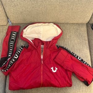 Really good condition red wind breaker